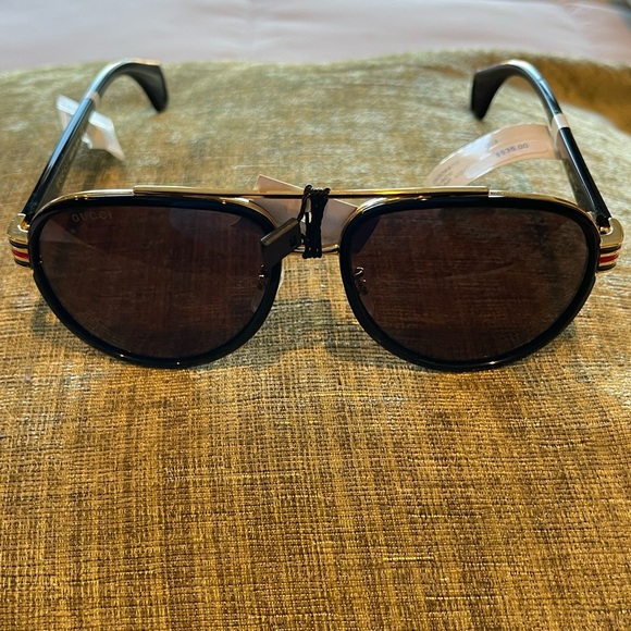 Brand new Gucci sunglasses. Never worn.